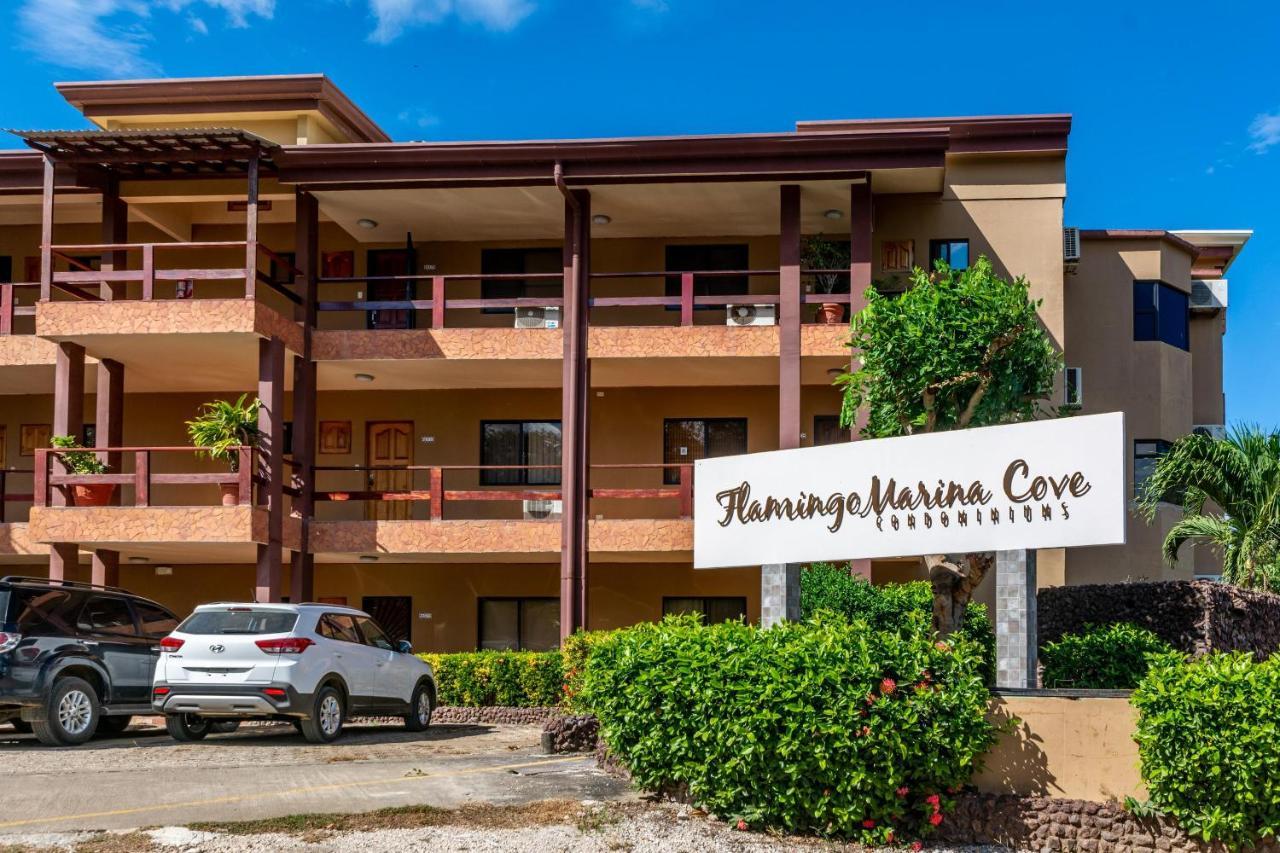 Warm Interiors And Orange Hues On Ground Floor In Front Of Beach Playa Flamingo Exterior foto